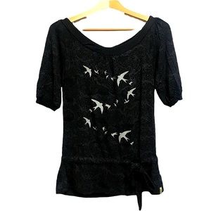 Black top with bird design